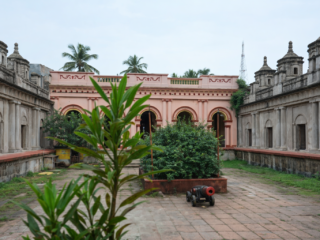 historic courtyard with arched entrances