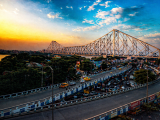 howrah bridge at sunset over cityscape