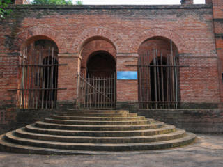 weathered arches and rusty gates